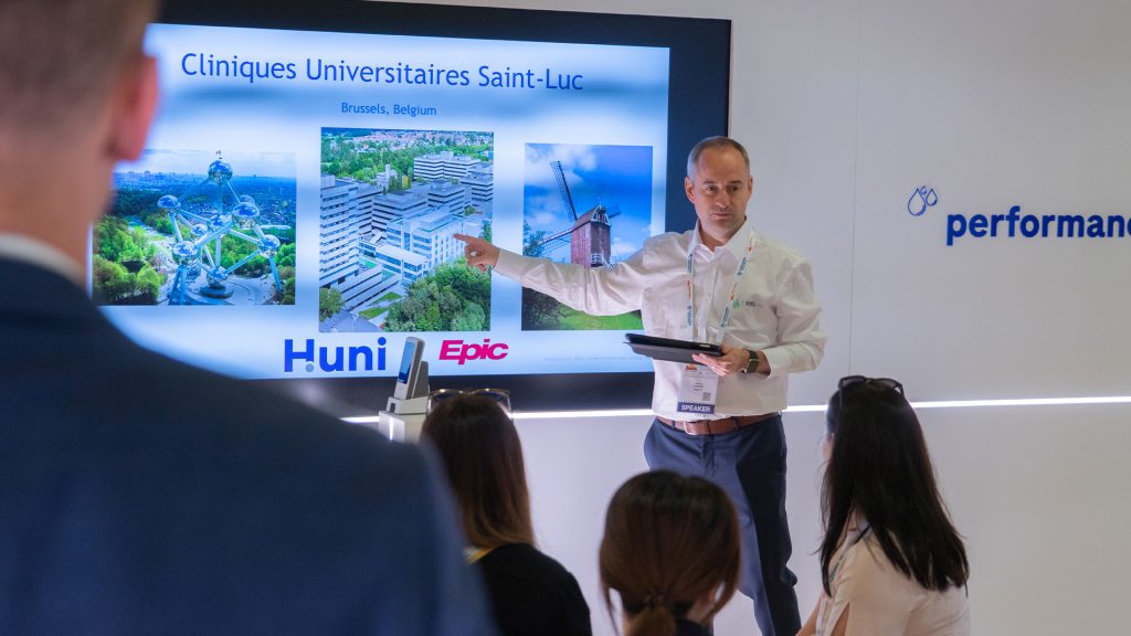 A speaker-led demonstration at EML Rome, showcasing the global impact of the cobas pulse system in modern clinical settings.