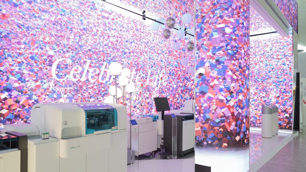LED screen installation showcasing Roche digital narratives