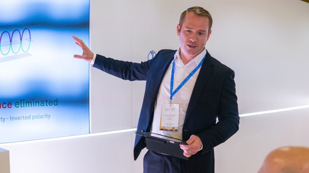 A focused, close-up shot of a professional presentation during the EML Rome event, at the cobas pulse innnovation room.